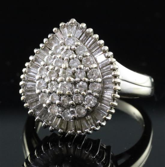 A modern 18ct white gold and diamond pear shaped cluster dress ring, size U.